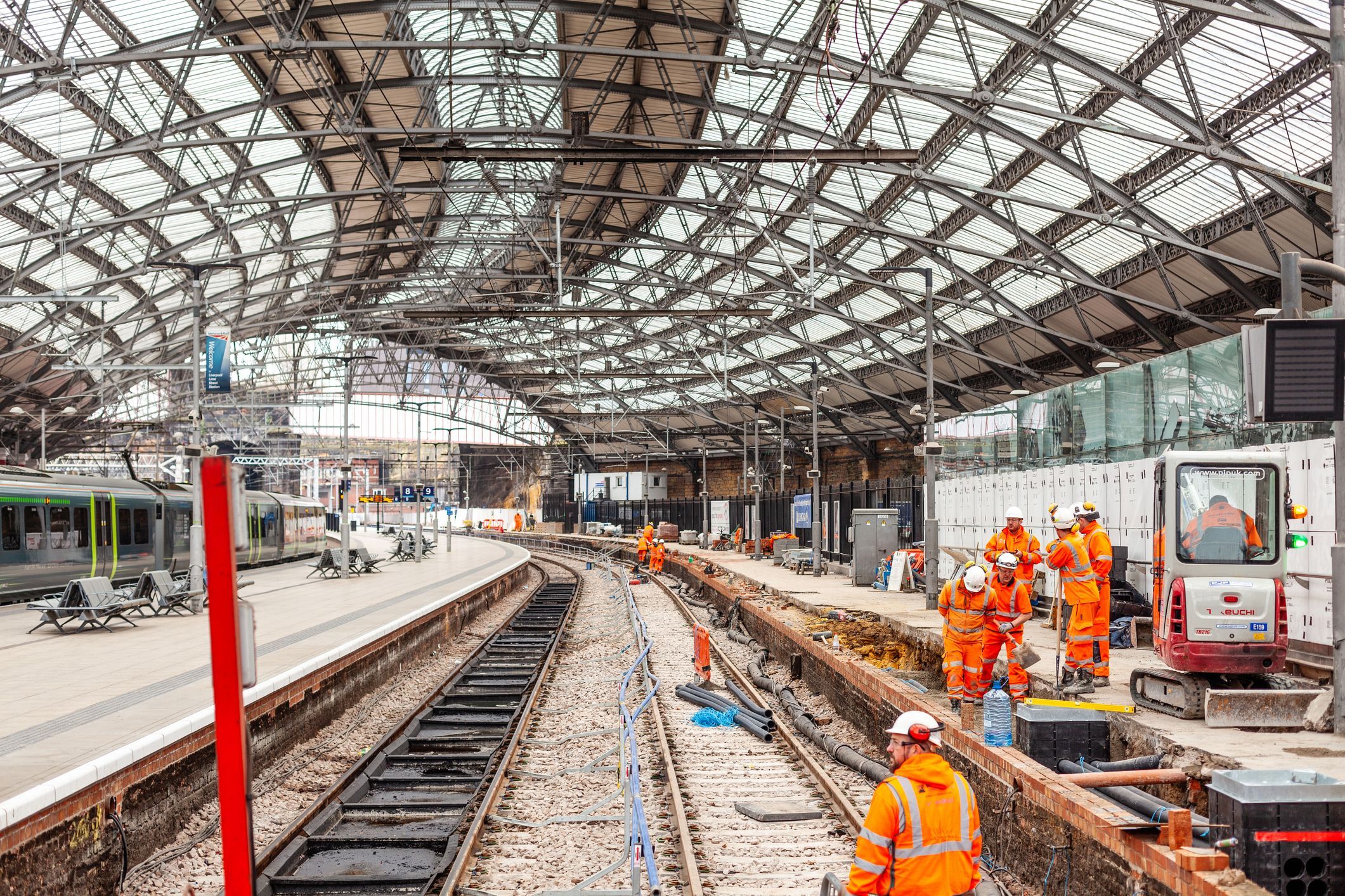 railway workers in a station 
